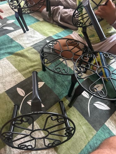 Customer photo review of UnitedCrafts Trivia Metal Pot Stand High Quality & Unique Design