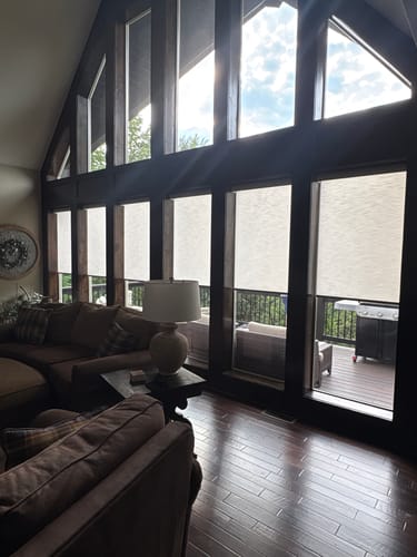 Customer photo review of SmartWings Motorized Light Filtering Roller Shades 70% Blackout Essential