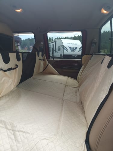 Customer photo review of NEW Waterproof Hard Bottom Car & Truck Seat Foldable Hammock Cover With Storage Pockets, Side Flaps, Headrest Straps, Seat Anchors, & Mesh Window (+FREE SAFETY BELT!)