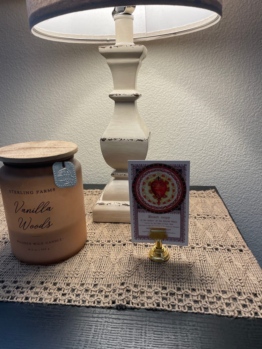 Customer photo review of Holy Card Stand – Stand Only – (Holy Card Not Included) – Brass-Colored Steel Stand to Display Holy Card