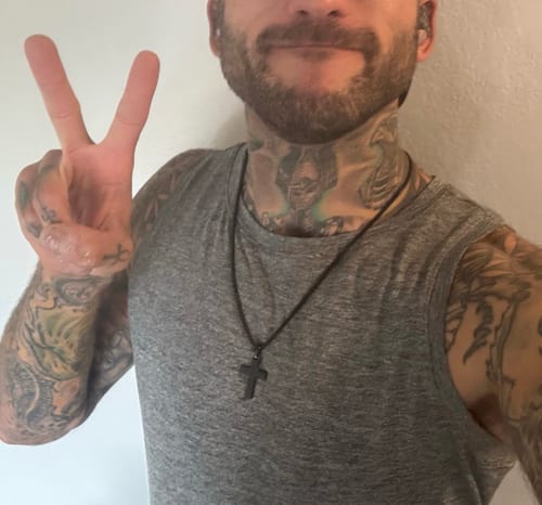 Customer photo review of Beveled Edge Cross Pendant