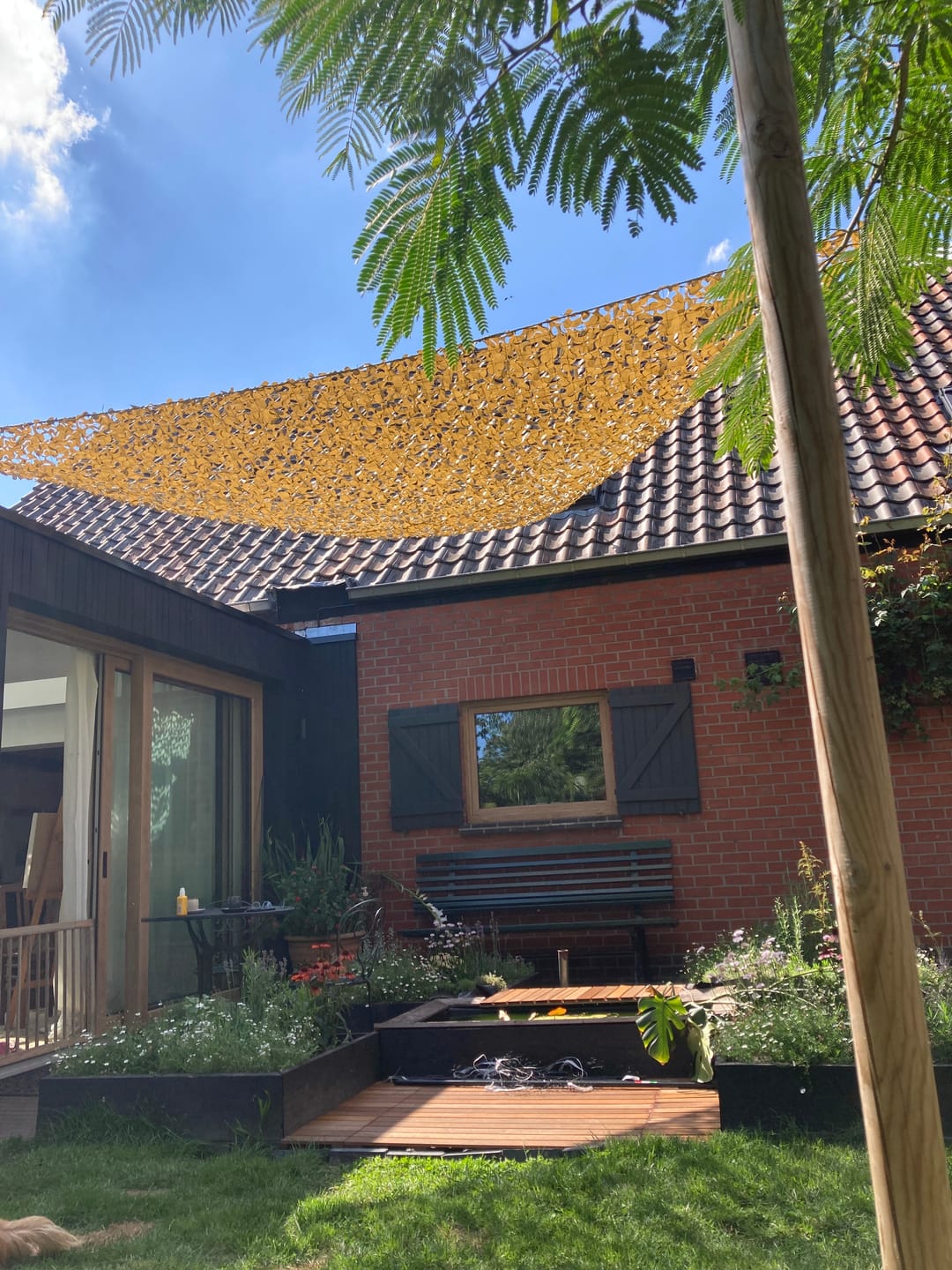 Customer photo review of Beige driehoekig camouflagenet