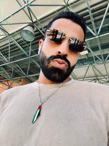 Customer photo review of Palestine Pride Map Necklace