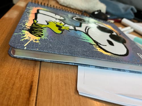 Customer photo review of Mooving - Cuaderno Triple Medio Oficio Papel Premium 80 g Snoopy
