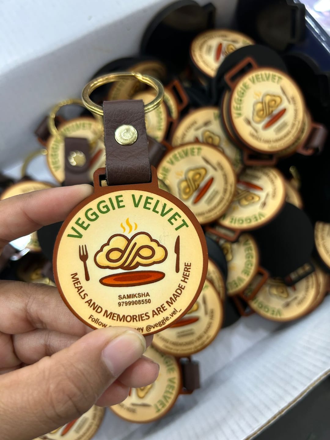 Customer photo review of Customized Premium Belt Keychains | Best for Brand Promotion | PrintMine.in