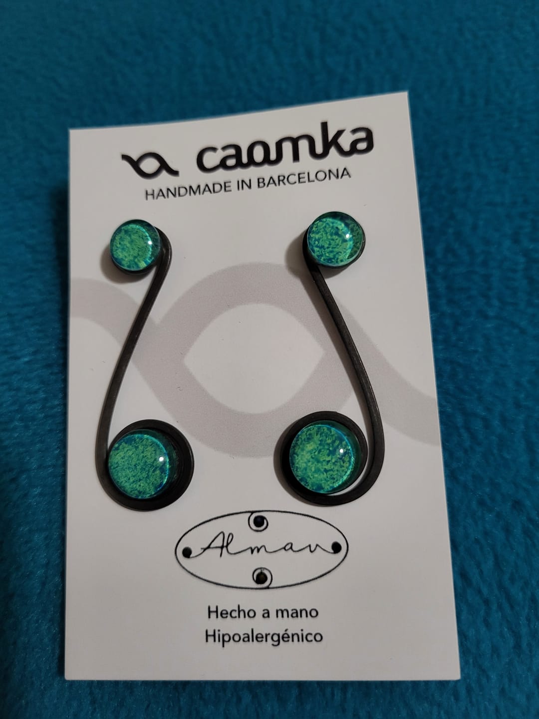 Customer photo review of Pendientes "Doble Sol Esmeralda" – Vidrio fundido y hierro forjado.