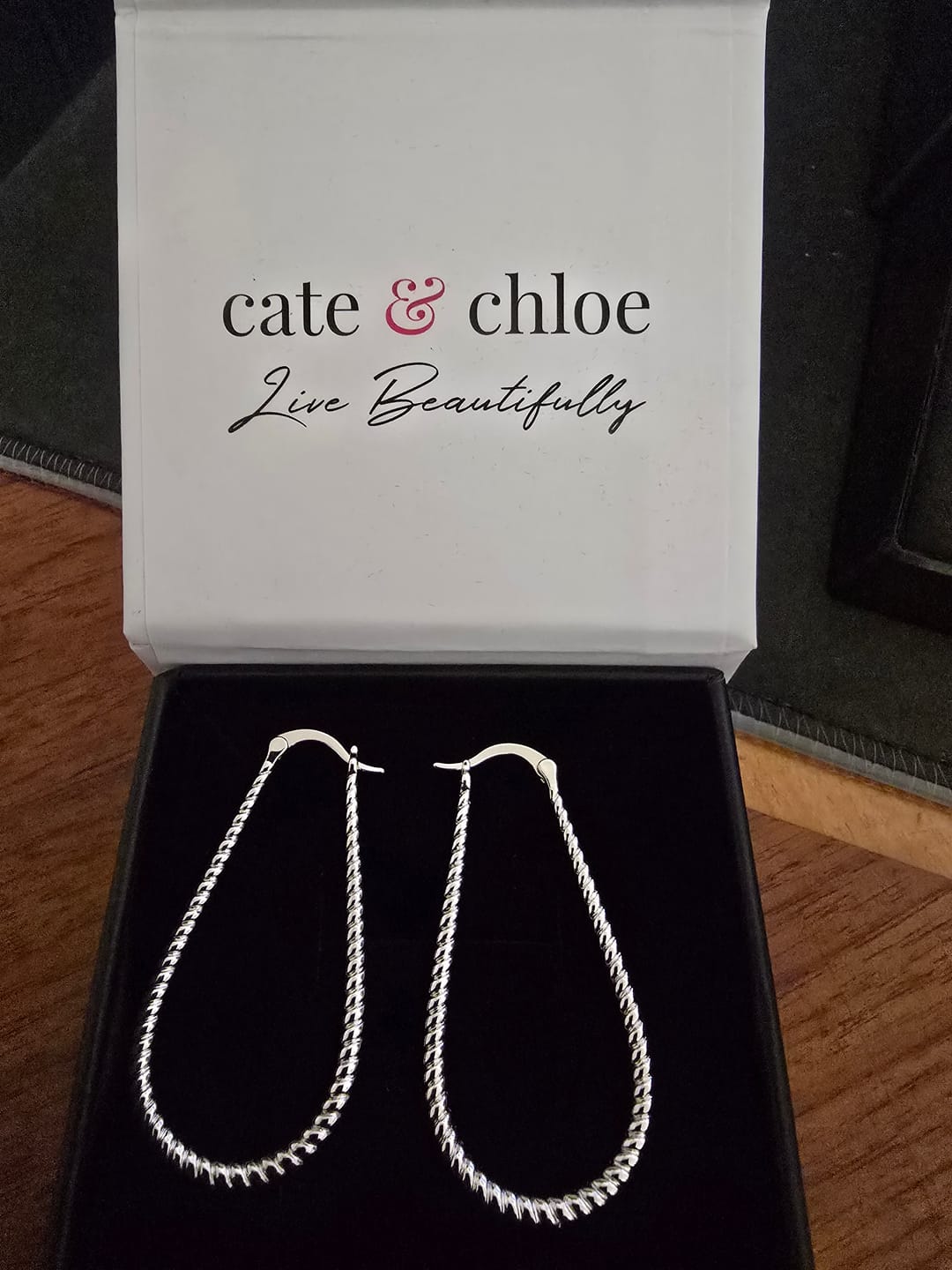 Customer photo review of Angelica 18k White Gold Plated 45mm Twisted U-Shaped Hoop Earrings