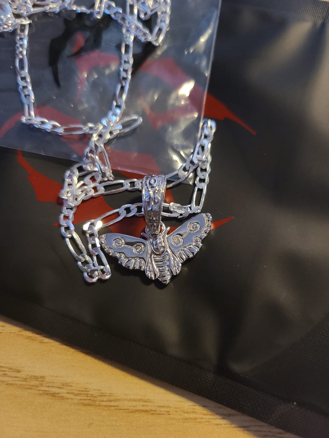 Customer photo review of MOTH PENDANT