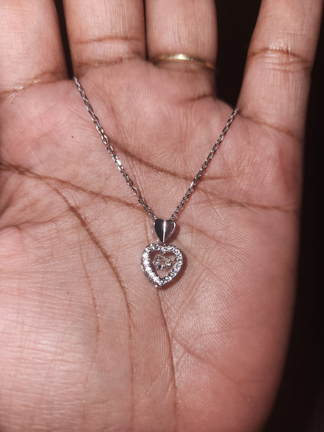 Customer photo review of Shelby 18k White Gold Plated Heart Dancing Necklace with Swarovski Crystals