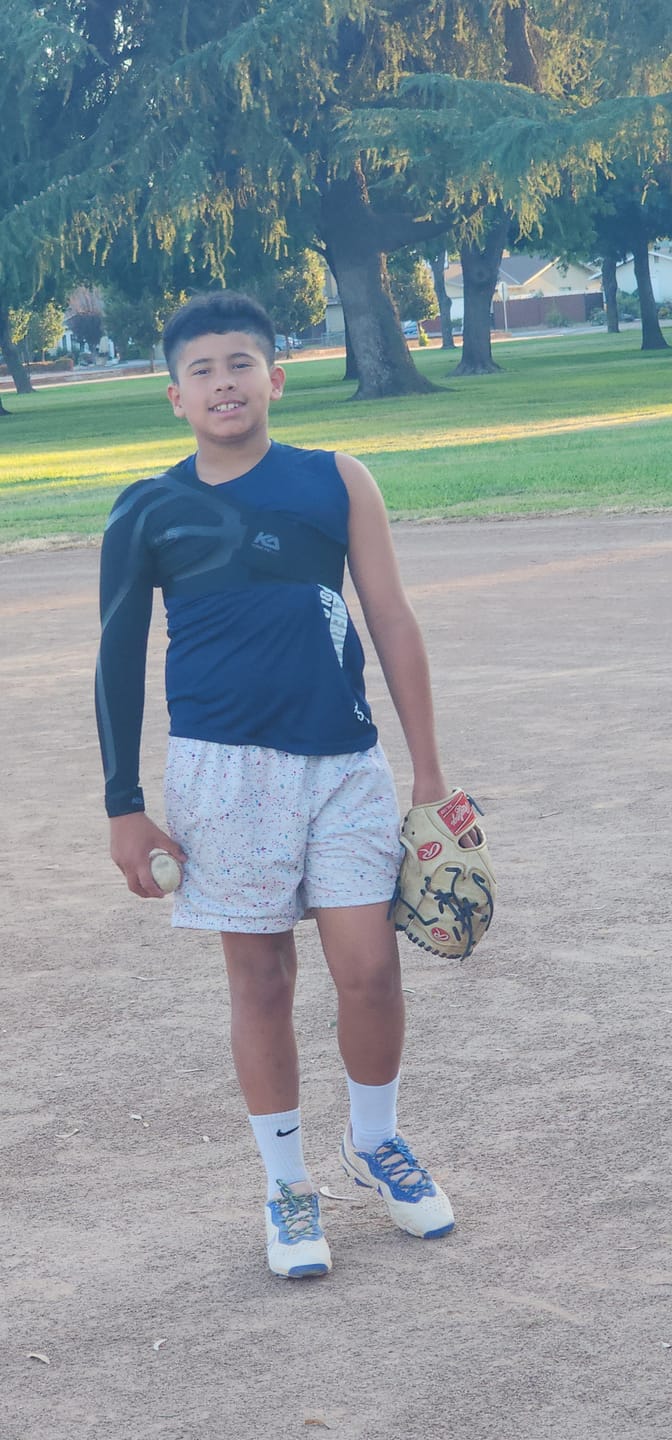 Customer photo review of Dynamic Shoulder & Elbow Stabilizer - K2 Youth Sleeve