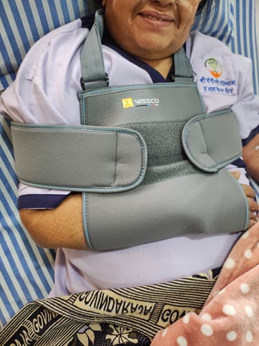 Customer photo review of Shoulder Immobilizer | Provides Firm Support for Shoulder Dislocation & Relieves Pain (Grey)