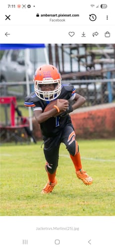Customer photo review of The Flintstones "Bedrock Blitz" Football Cleats - Quantum Speed by Phenom Elite