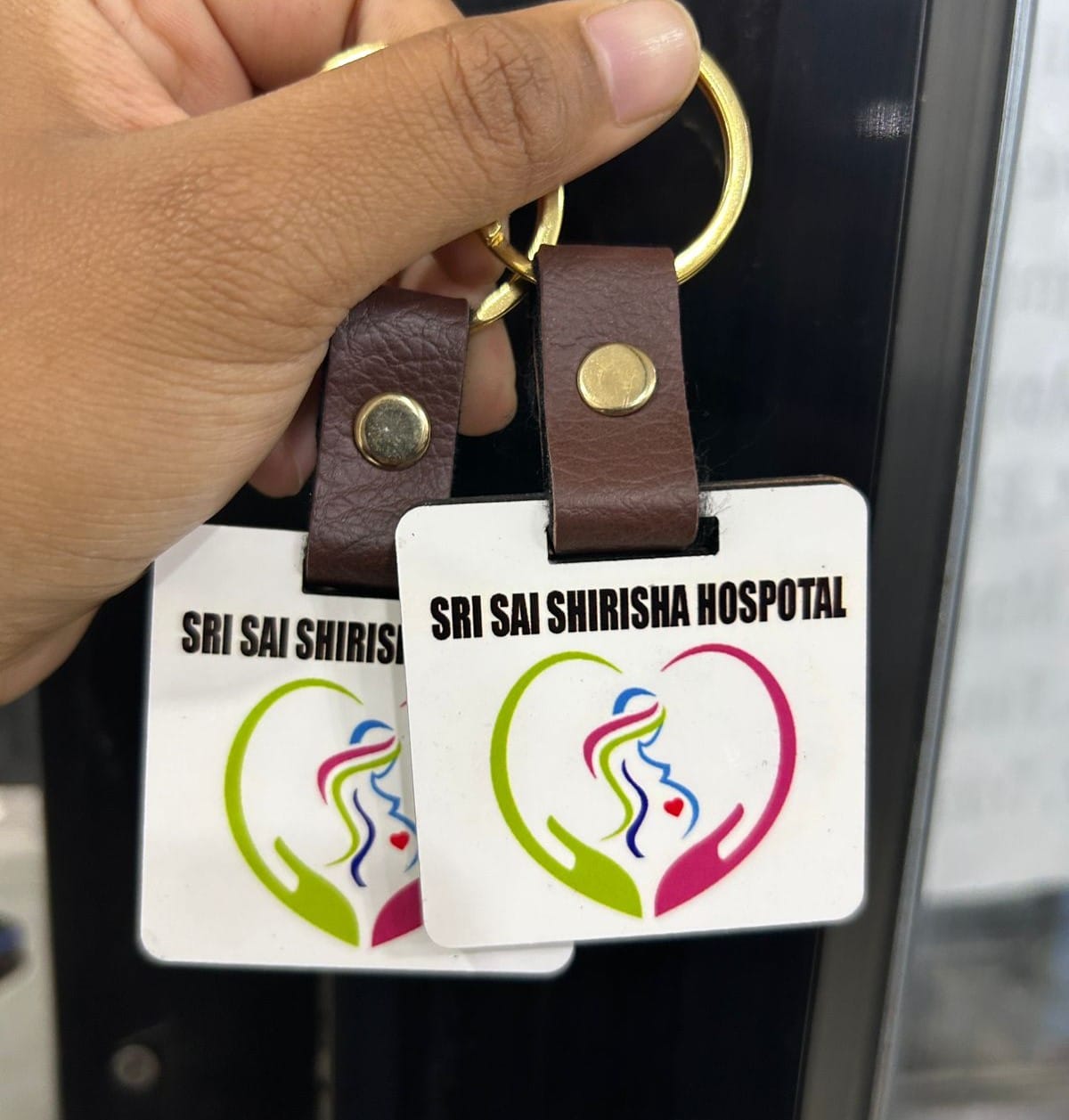 Customer photo review of Customized Premium Belt Keychains | Best for Brand Promotion | PrintMine.in