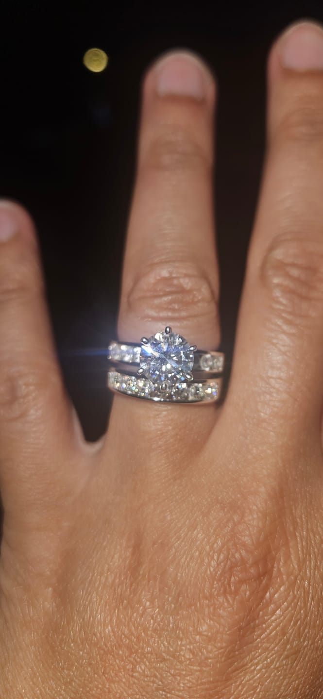 Customer photo review of Channel Set Moissanite Half Eternity Wedding Band Ring In Sterling Silver