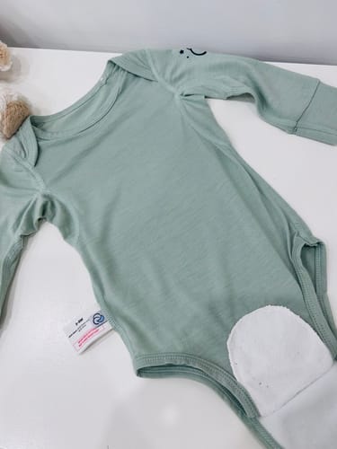 Customer photo review of ClimaCuddle Baby Bodysuit Long Sleeve - Merino Wool & Rayon Bamboo - Pea Green
