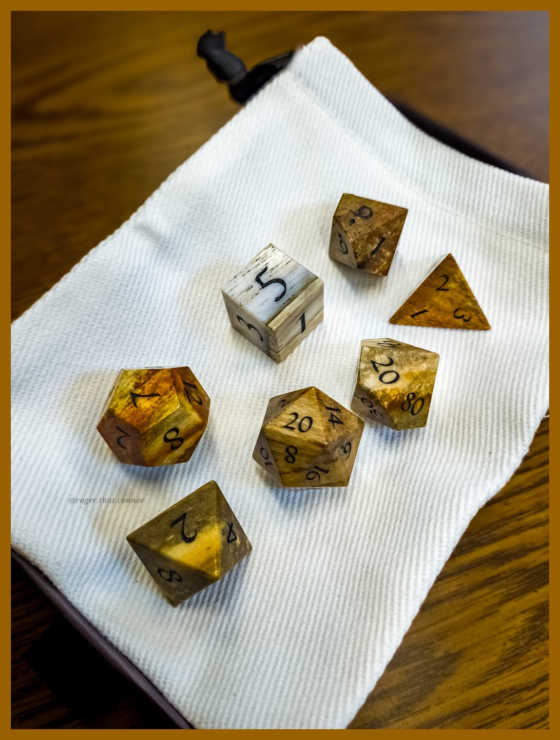Customer photo review of URWizards D&D Petrified Wood Gemstone Engraved Dice Set(Limited edition)