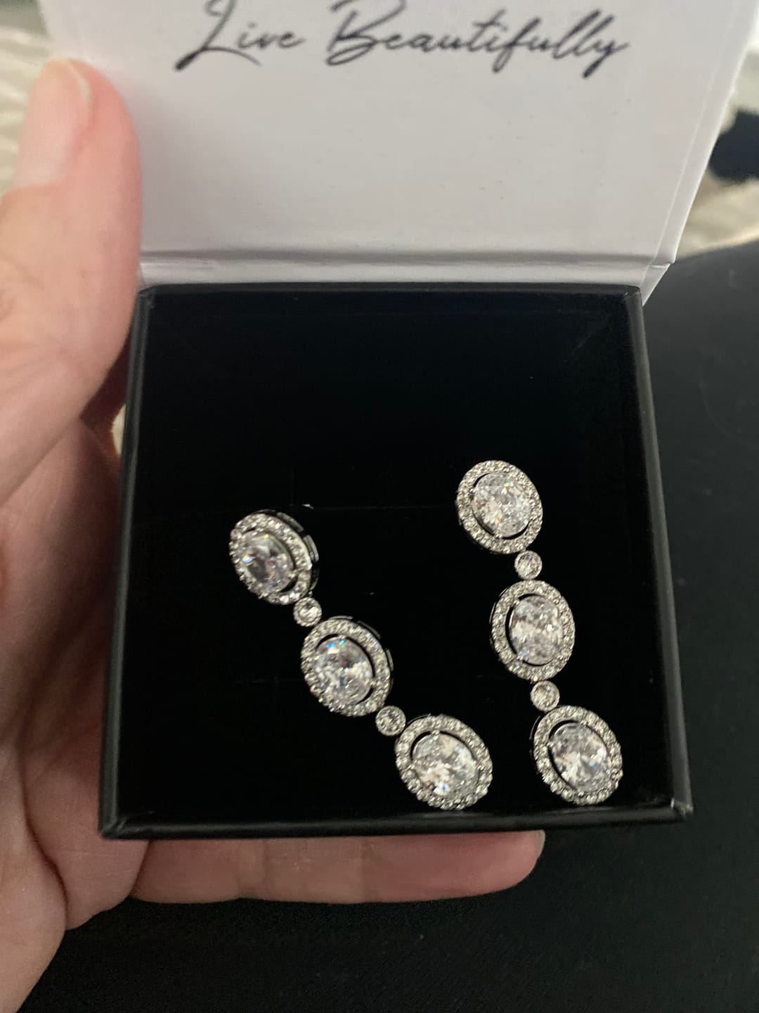 Customer photo review of Lorraine 18k White Gold Plated Dangle Earrings with Simulated Diamond Crystals
