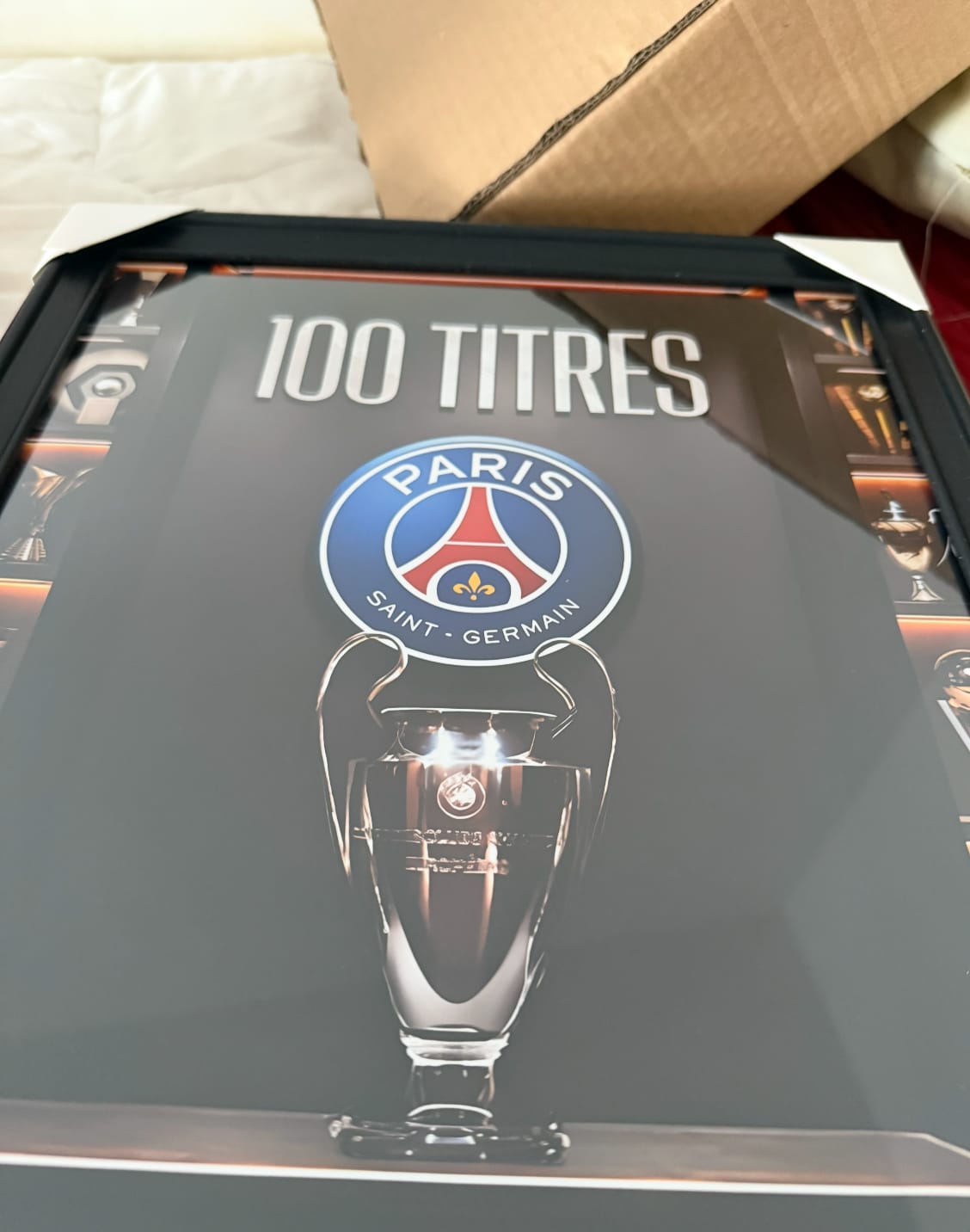 Customer photo review of Cadre photo 100 Titres Paris Saint-Germain Ligue des champions