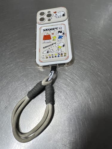 Customer photo review of Snoopy Phone Case with Card Holder & Lanyard