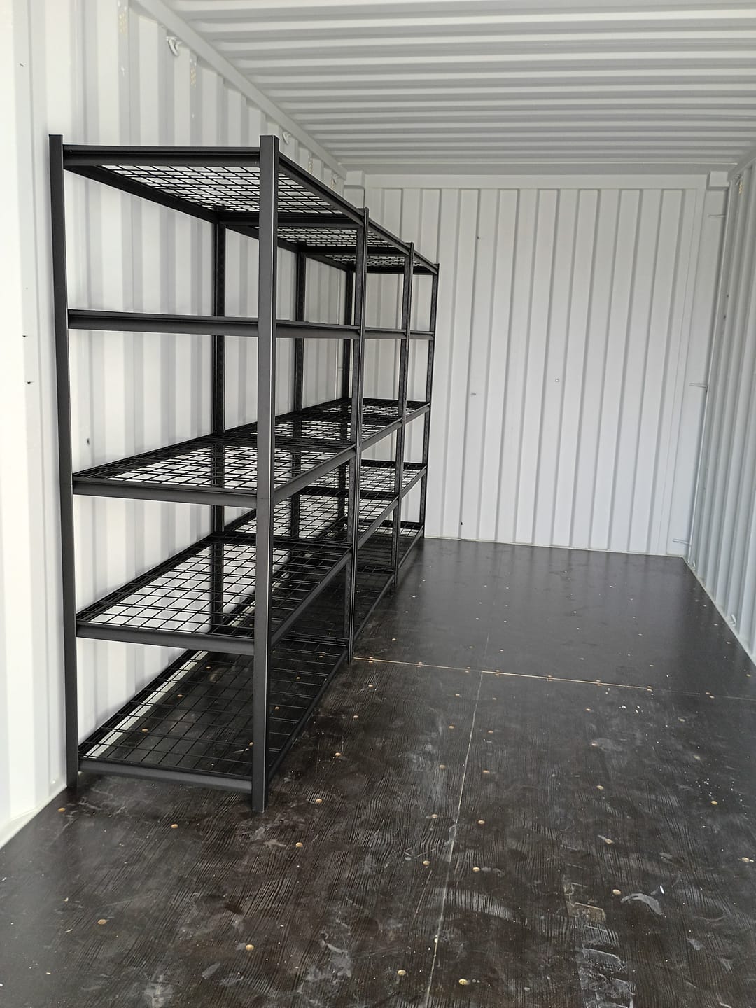 Customer photo review of REIBII 48"W Heavy Duty Garage Shelving, 5-Tier Adjustable Storage Shelves Garage, 3000LBS Rust-Proof Storage Shelving for Warehouse, Basement