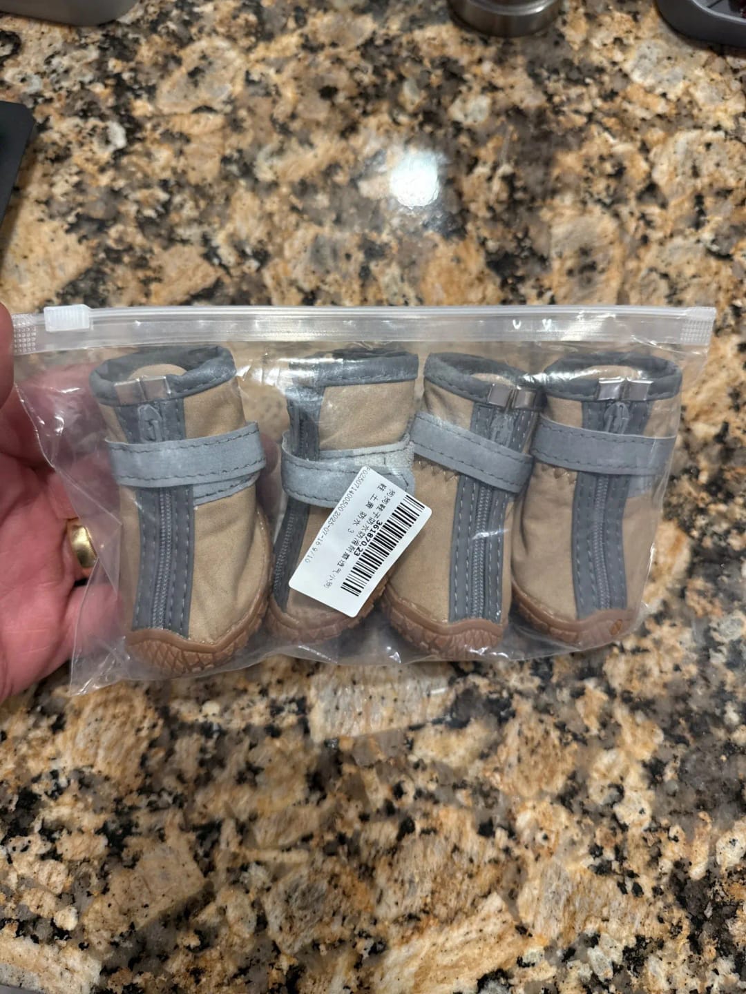 Customer photo review of Non-Slip Dog Shoes with Warm Plush Lining – Waterproof Pet Boots for Winter, Walking & Outdoor Protection (4 Pack)