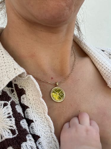 Customer photo review of Engravable Compass Necklace