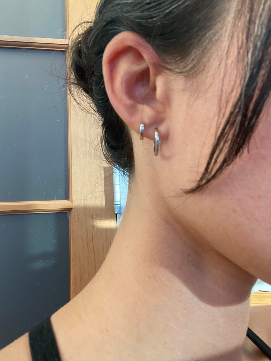 Customer photo review of Ash Micro Huggie Hoop Earrings