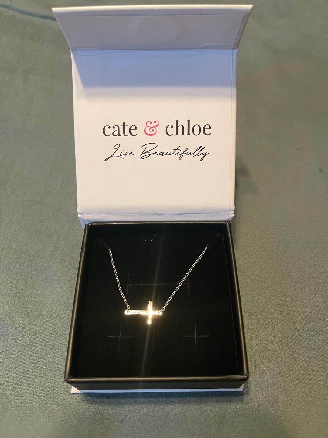 Customer photo review of Nancy 18k White Gold Plated Cross Pendant Necklace