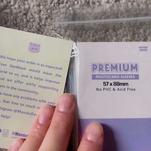 Customer photo review of PREMIUM PHOTOCARD SLEEVES - PURPLE VERSION (57x88MM)