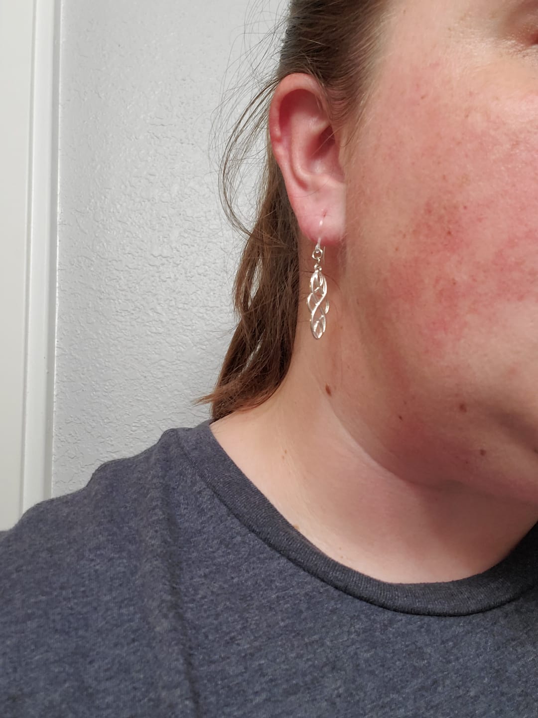 Customer photo review of Infinity Loops Dangles Hypoallergenic Earrings for Sensitive Ears Made with Plastic Posts