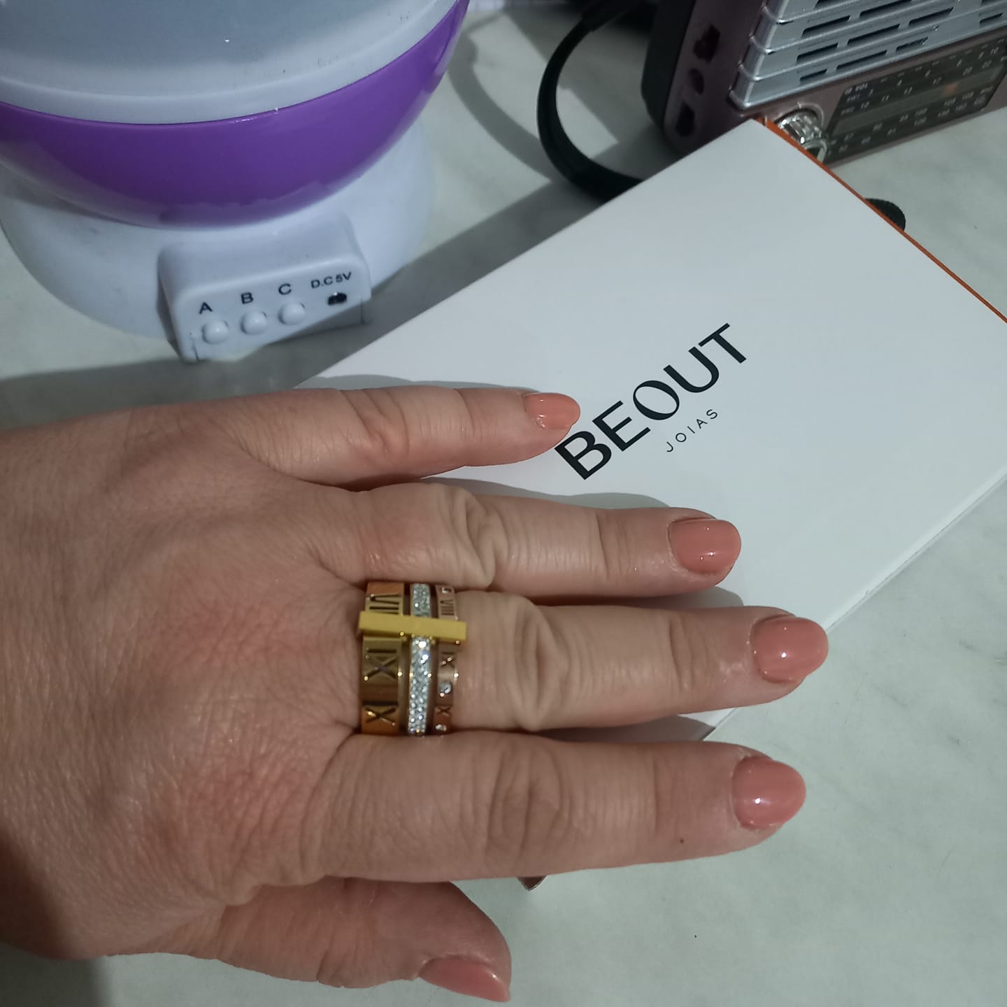 Customer photo review of Anel Triplo Momentos Banhado em Ouro 18k