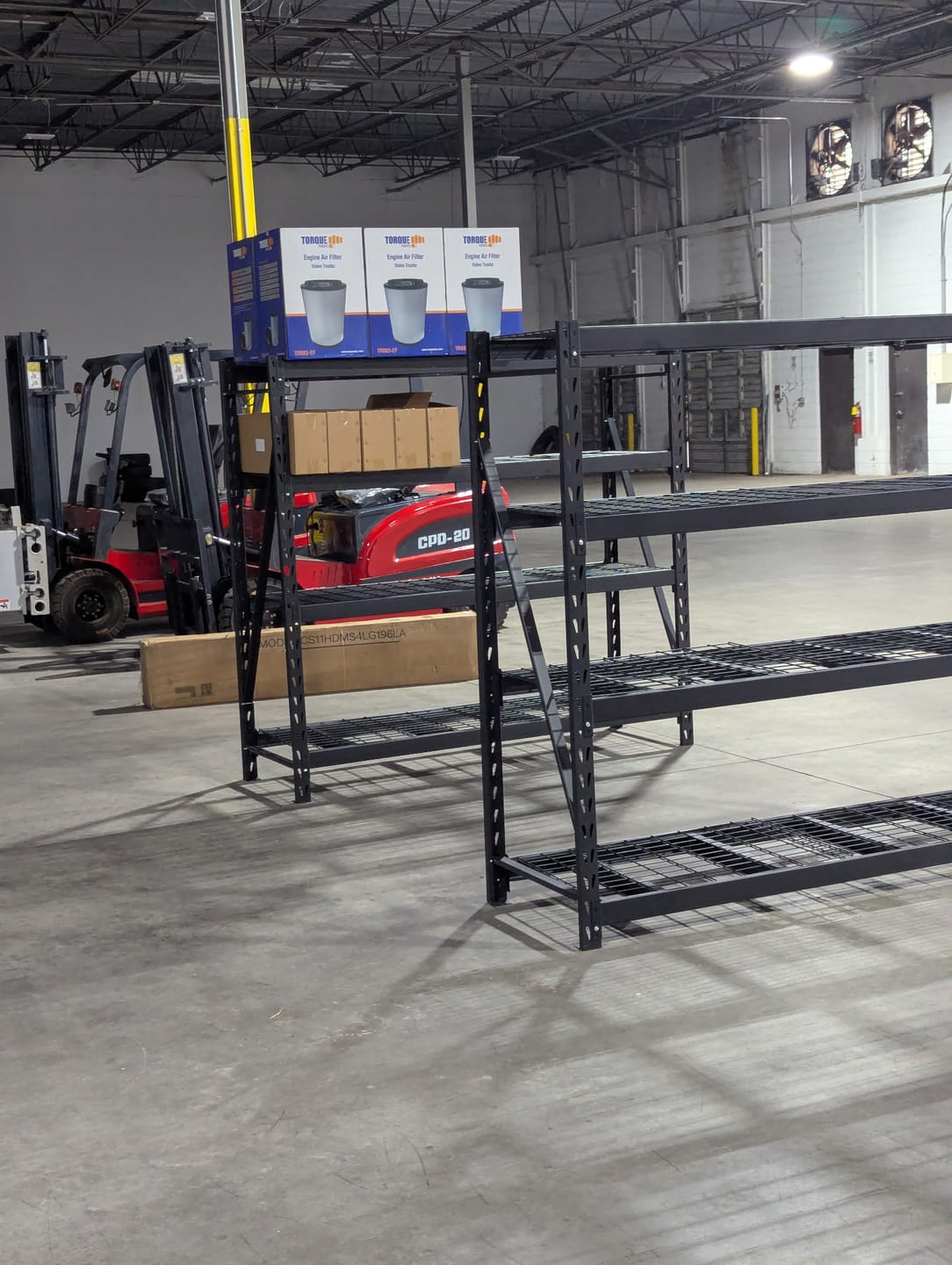 Customer photo review of REIBII 77.2" W Industrial Heavy-Duty Garage Shelving,4-Tier Adjustable Steel Storage Shelves for Garage,Warehouse,Basement