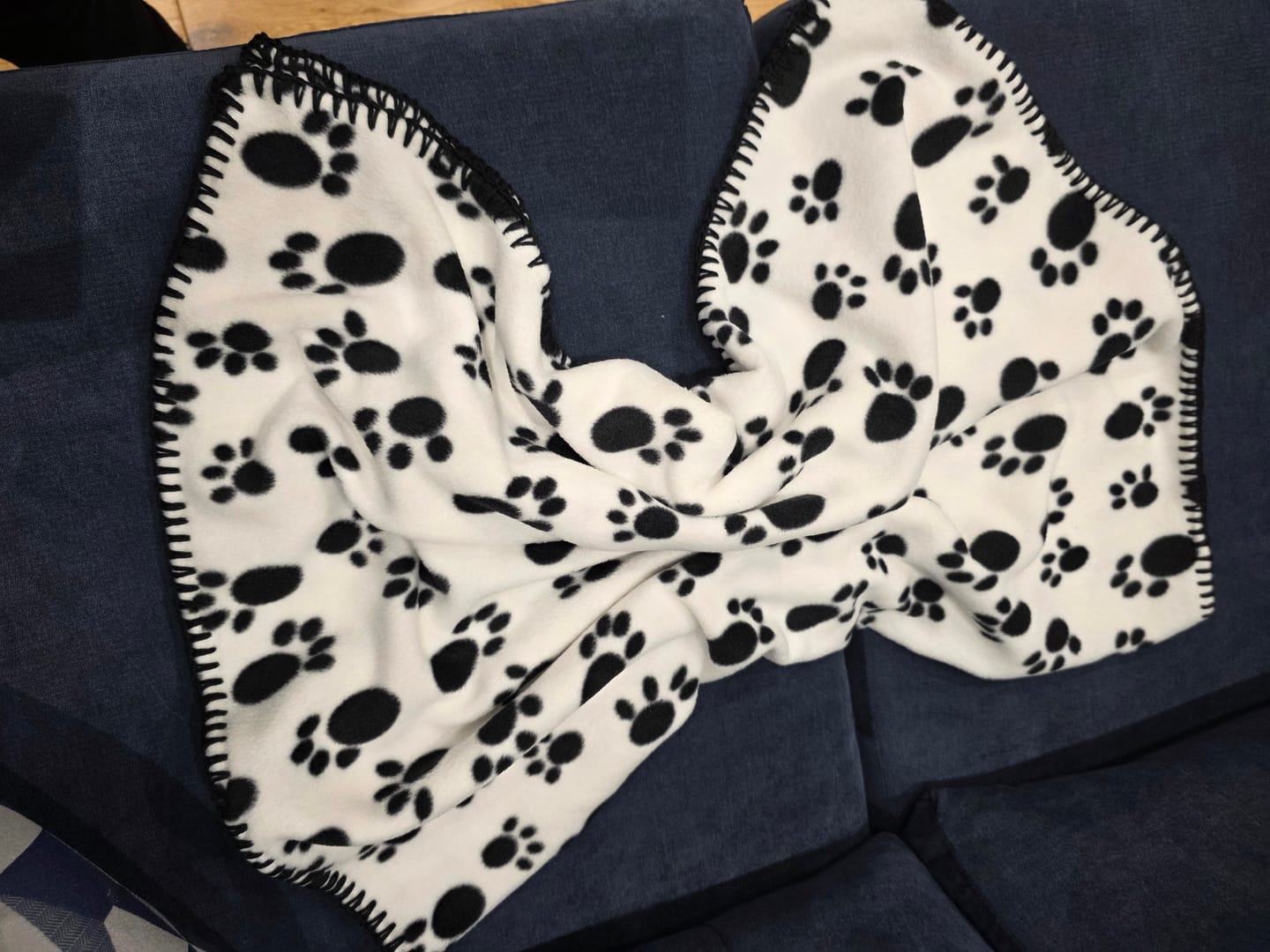 Customer photo review of Black Paws on White Anti Pill Polar Fleece Fabric
