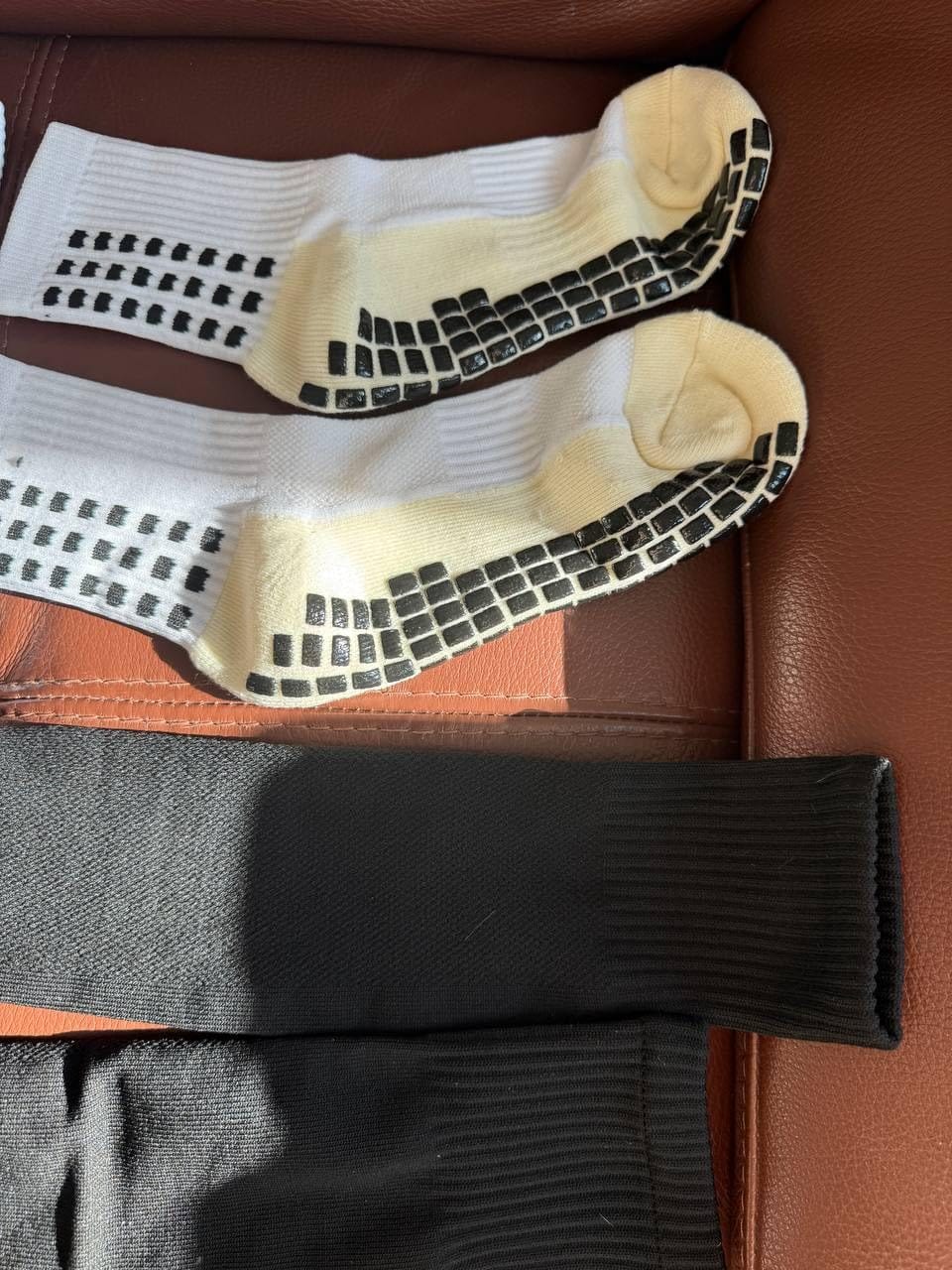 Customer photo review of The Grip Sock Dual Pack Leg Sleeve Bundle