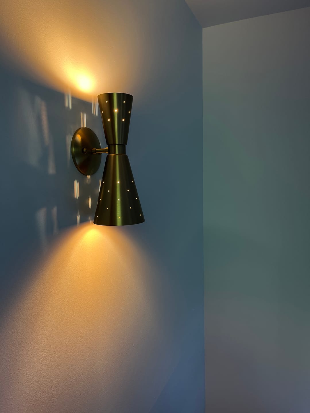 Customer photo review of 2-Light Metal Starry Hourglass Wall Sconce
