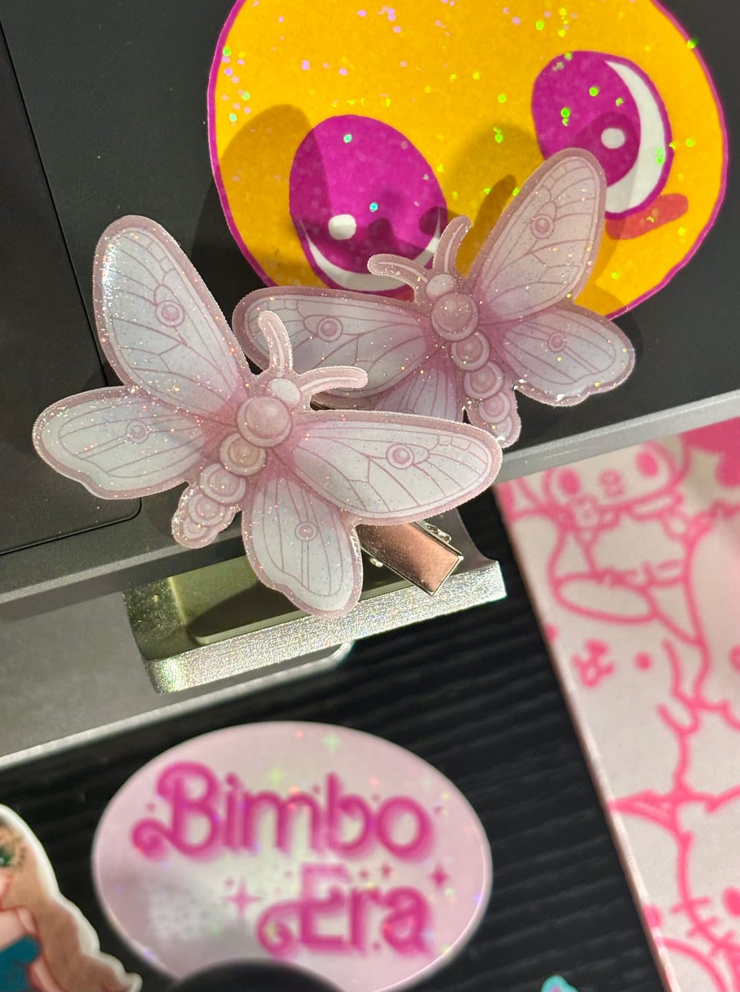 Customer photo review of pink moth hair clip set