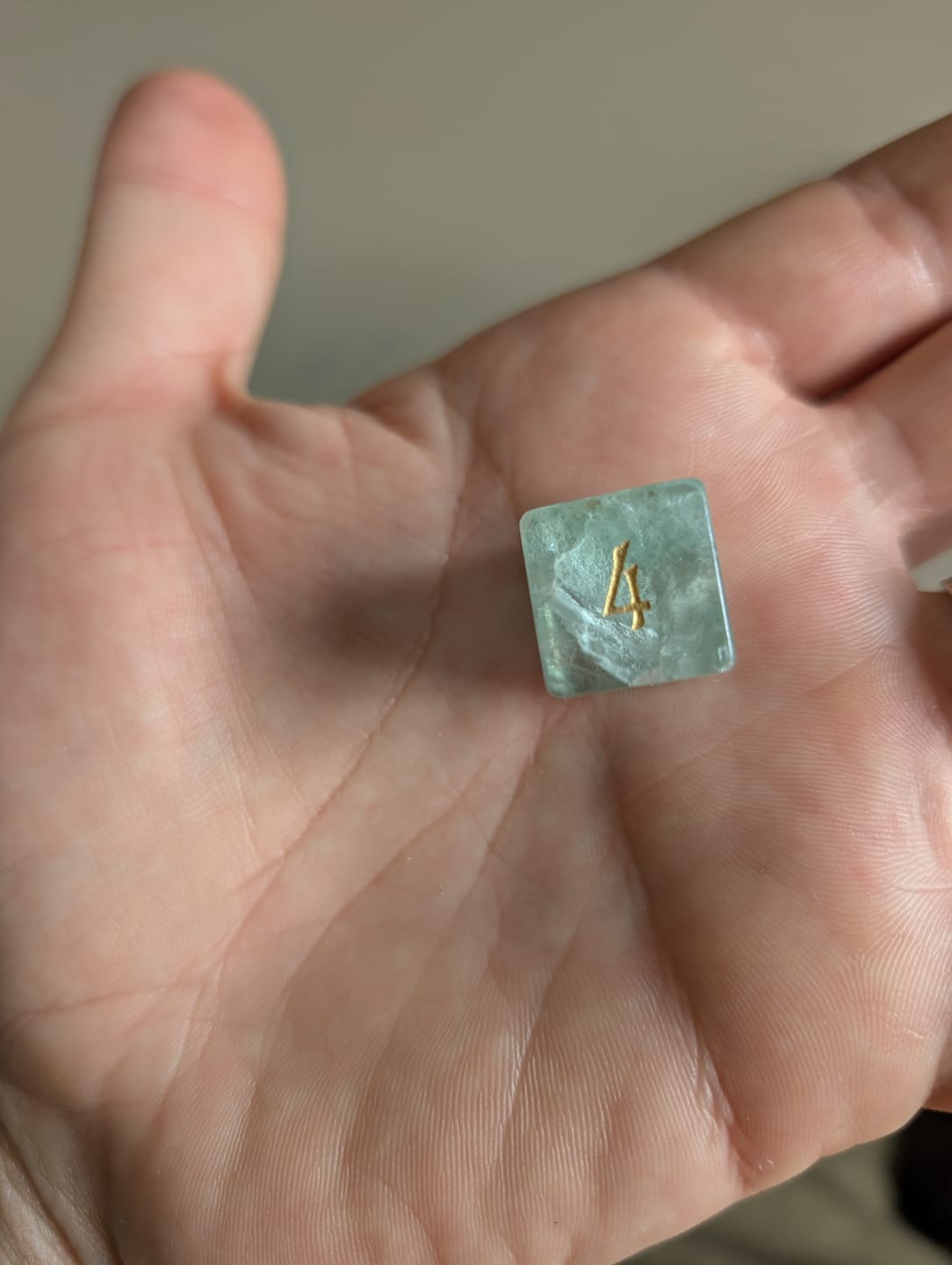 Customer photo review of URWizards D&D Green Fluorite Gemstone Engraved Dice Set Moon Style