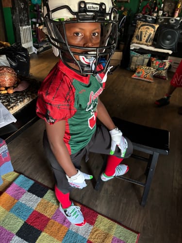 Customer photo review of The Officially Licensed Joker Football Gloves - VPS3 by Phenom Elite