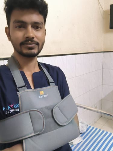 Customer photo review of Shoulder Immobilizer | Provides Firm Support for Shoulder Dislocation & Relieves Pain (Grey)