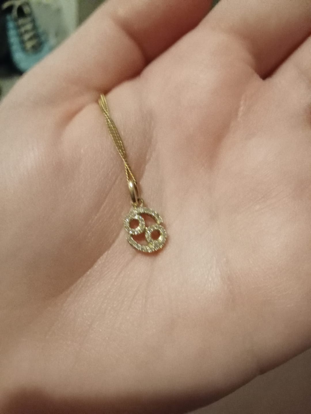 Customer photo review of Diamond Star Sign Pendant in 9ct Yellow Gold