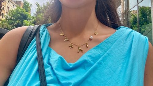 Customer photo review of GOLD OCEAN LETTER NECKLACE