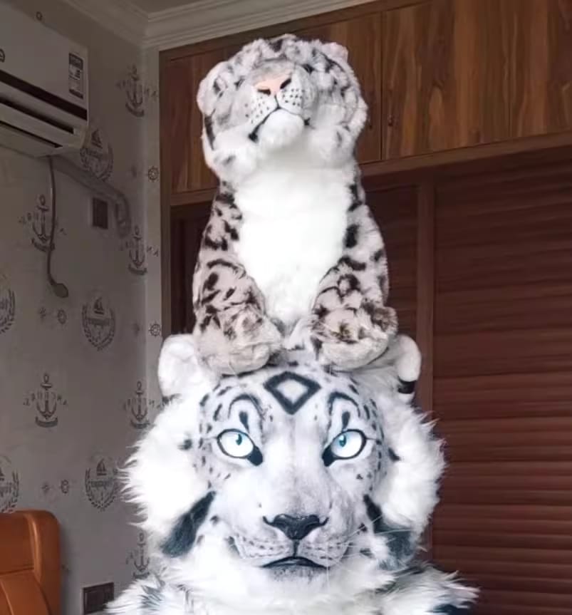 Customer photo review of Realistic Snow Leopard Plush Toy – Soft, Cuddly, and Perfect for Gifts