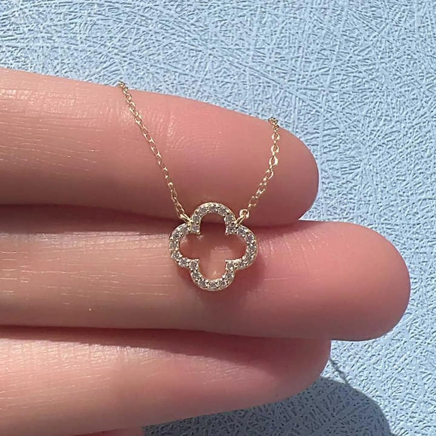 Customer photo review of Aurora Clover Zirconia Necklace
