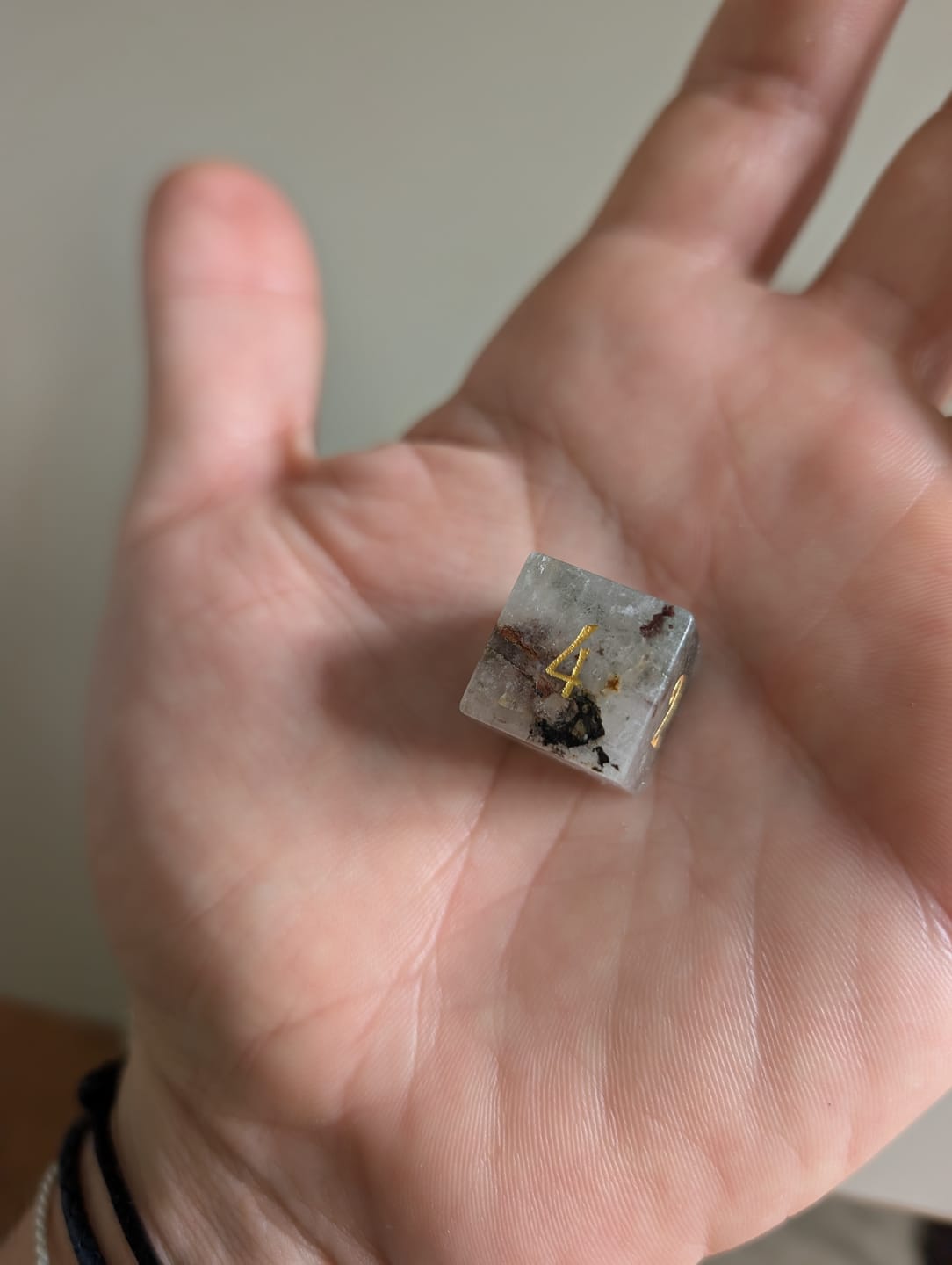 Customer photo review of URWizards D&D Phantom Quartz Gemstone Engraved Dice Set(Limited edition)