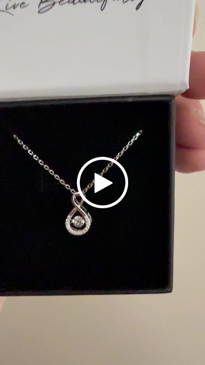 Customer video review of Martha 18k White Gold Plated Infinity Dancing Pendant Necklace with Swarovski Crystals