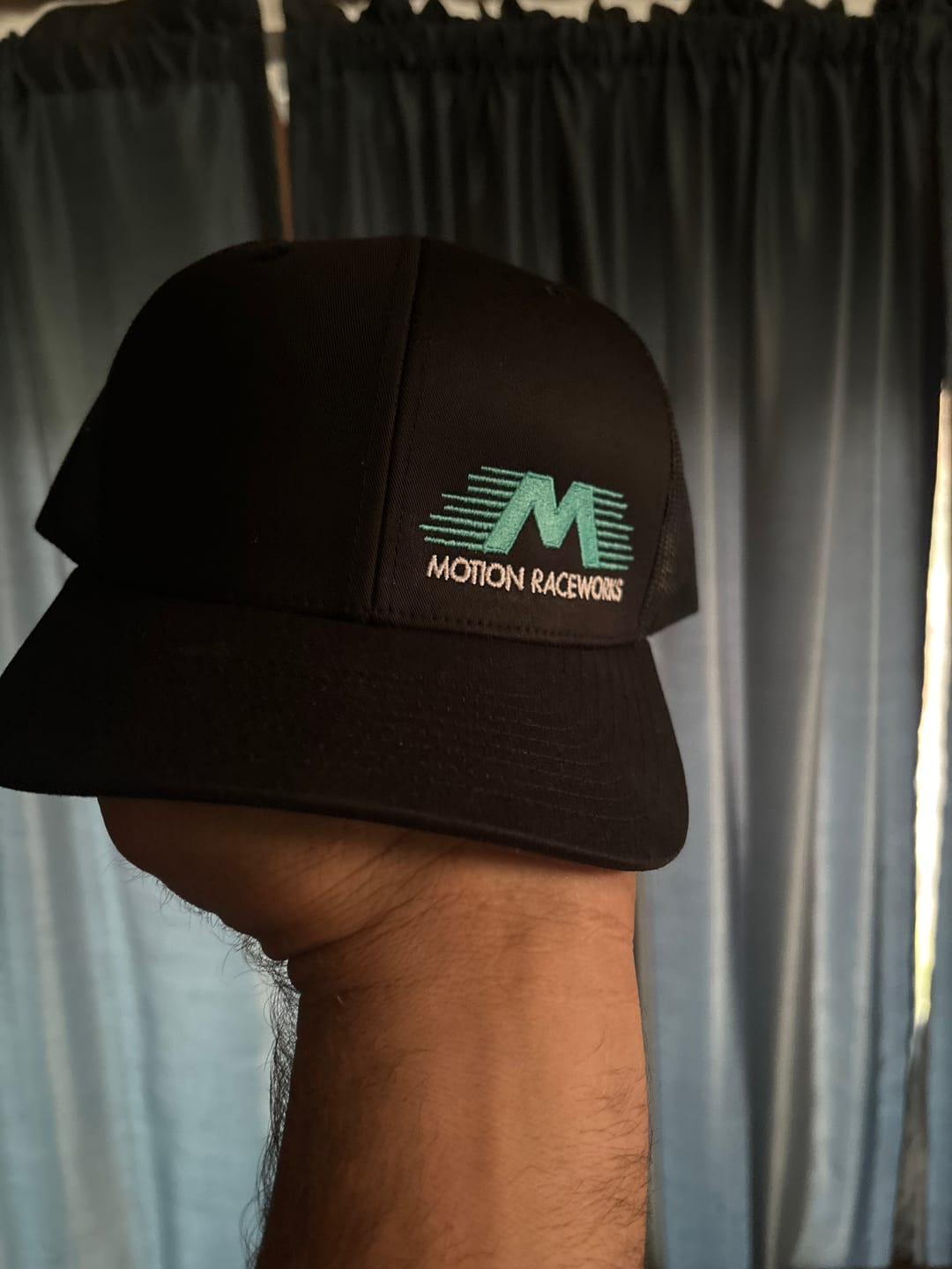 Customer photo review of Calypso Flying M Trucker Hat
