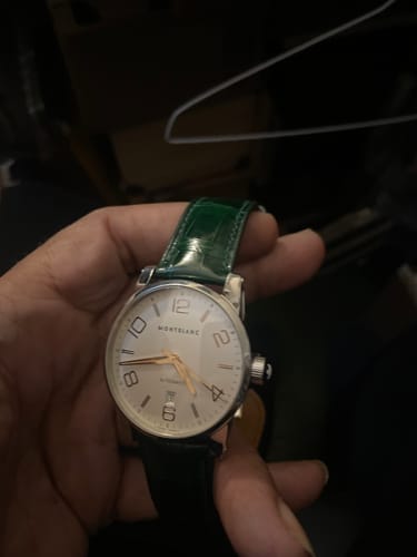 Customer review photo of a dark green crocodile leather watch strap