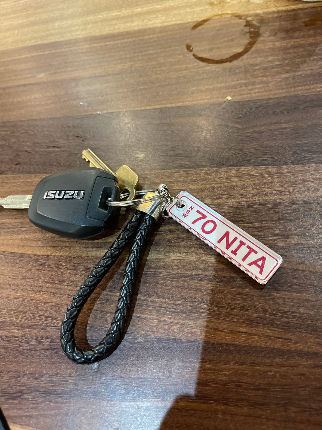 Customer photo review of NSW Colour on White Licence Plate Custom Keychain