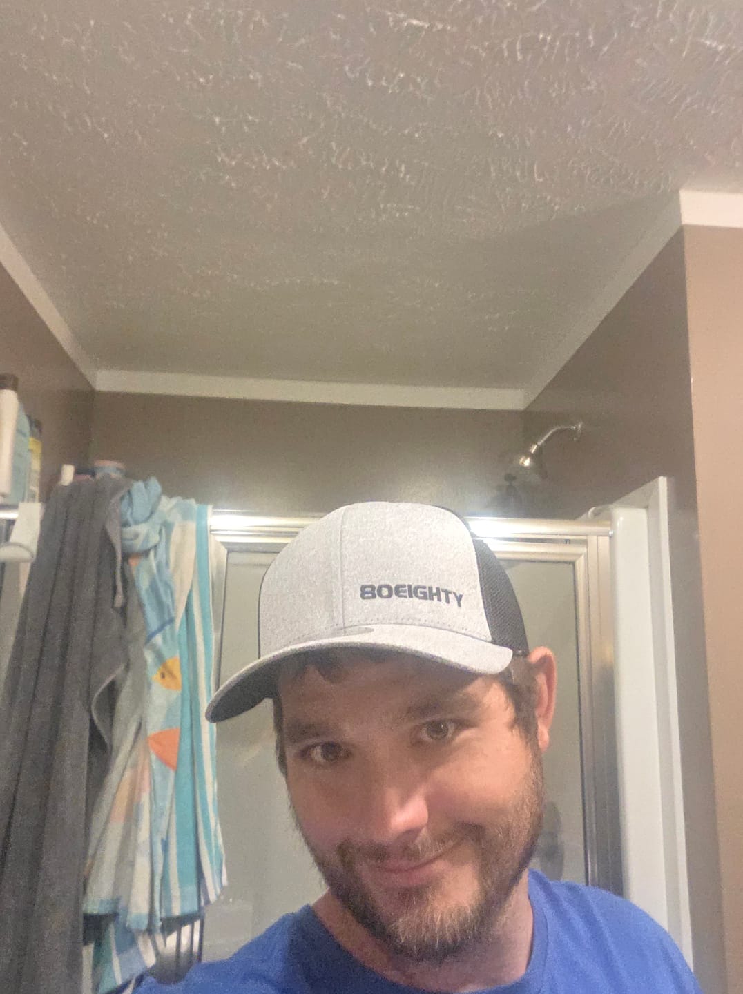 Customer photo review of 80Eighty® Melange Trucker Hat