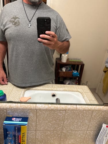 Customer photo review of In God We Trust - American Flag Cross  Necklace: Helps Pair Veterans With A Service Dog Or Shelter Dog